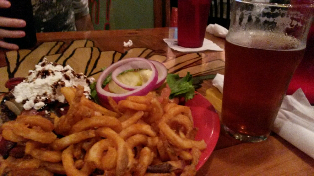 Burger, curly fries, and beer